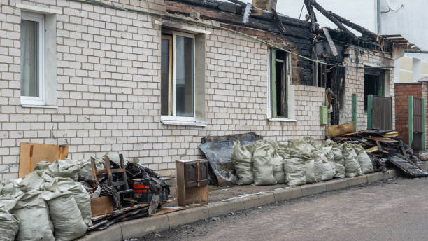 Professional Fire Damage Repair technician working in Cologne, NJ